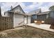 Backyard with patio area and modern wood furniture, perfect for relaxing and entertaining at 1715 Fletcher Ave, Indianapolis, IN 46203