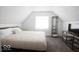 Bedroom with plush carpeting, a comfortable bed, and a TV console at 1715 Fletcher Ave, Indianapolis, IN 46203