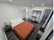 Cozy bedroom with vinyl floors, a comfortable bed, closet, and natural light at 1715 Fletcher Ave, Indianapolis, IN 46203