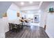 Dining area with modern table and chairs, seamlessly connected to the kitchen at 1715 Fletcher Ave, Indianapolis, IN 46203