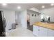 Bright kitchen features white cabinets, butcher block countertops, and stainless steel appliances at 1715 Fletcher Ave, Indianapolis, IN 46203
