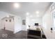 Bright living room with neutral paint, hardwood floors, and ample natural light at 1715 Fletcher Ave, Indianapolis, IN 46203