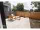 Outdoor patio with modern wood furniture, perfect for relaxing and entertaining at 1715 Fletcher Ave, Indianapolis, IN 46203