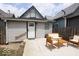 Backyard with patio area and modern wood furniture, perfect for relaxing and entertaining at 1715 Fletcher Ave, Indianapolis, IN 46203