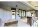 Inviting covered porch featuring seating and a stylish entrance door at 1715 Fletcher Ave, Indianapolis, IN 46203
