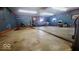 A spacious garage with concrete floors can be used as a workshop or storage space at 18103 N 300 W, Summitville, IN 46070
