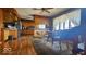 An eat-in kitchen with classic wood cabinets, stainless steel appliances, and lots of sunlight at 18103 N 300 W, Summitville, IN 46070