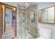 Bathroom features a glass-enclosed shower with tiled walls and a built in shampoo niche at 241 S Walnut St, Jamestown, IN 46147
