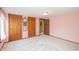Bedroom features plush carpeting, light fixture, and painted in pink tones at 241 S Walnut St, Jamestown, IN 46147