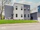 Contemporary two-story home with modern architecture and manicured lawn at 244 N Summit St, Indianapolis, IN 46201