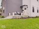 Inviting front porch with seating and potted plants, offering a cozy outdoor space at 244 N Summit St, Indianapolis, IN 46201