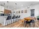 Open-concept kitchen with a large island, modern appliances, and stylish pendant lighting at 244 N Summit St, Indianapolis, IN 46201