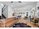 Open-concept living space with stylish decor, hardwood floors, and abundant natural light at 244 N Summit St, Indianapolis, IN 46201