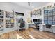 Spacious home office with dual workstations, built-in shelves, and plenty of natural light at 244 N Summit St, Indianapolis, IN 46201