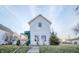 Charming home with mature tree in front yard and a quaint, covered mailbox at 2639 Central Ave, Anderson, IN 46016