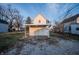 Exterior view of the back of a home showcasing a covered porch at 2639 Central Ave, Anderson, IN 46016