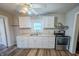 Functional kitchen featuring stainless steel appliances, clean countertops, and wood-look floors at 2639 Central Ave, Anderson, IN 46016