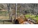 Elevated deck offering serene views and outdoor dining at 2895 Prairie Stream Way, Columbus, IN 47203