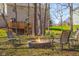 Inviting outdoor firepit area with seating and landscaping at 2895 Prairie Stream Way, Columbus, IN 47203
