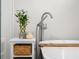 Bathroom featuring a standalone tub, decor, a faucet and a decorative plant at 2895 Prairie Stream Way, Columbus, IN 47203