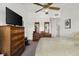 Primary bedroom featuring carpet and wooden furniture at 2895 Prairie Stream Way, Columbus, IN 47203