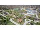 Aerial view of house and neighborhood, close to community baseball field, showcasing location near school at 298 Northridge Dr, Mooresville, IN 46158
