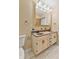Bright bathroom features a double sink vanity with updated fixtures and vanity lights at 298 Northridge Dr, Mooresville, IN 46158