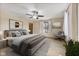 Cozy bedroom with neutral tones, a plush bed, and ample natural light creating a relaxing retreat at 298 Northridge Dr, Mooresville, IN 46158