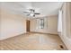 Comfortable bedroom featuring wood-look floors and a ceiling fan and window at 298 Northridge Dr, Mooresville, IN 46158