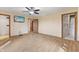 The bedroom features wood-look flooring, ceiling fan and neutral walls at 298 Northridge Dr, Mooresville, IN 46158