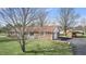 Spacious backyard featuring a detached garage and covered parking spot with well-maintained landscaping around property at 298 Northridge Dr, Mooresville, IN 46158