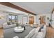 Bright living room featuring a modern design, hardwood floors, and an abundance of natural light at 298 Northridge Dr, Mooresville, IN 46158