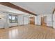 Spacious living room boasts wood flooring, exposed beams, and a large window at 298 Northridge Dr, Mooresville, IN 46158