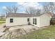This single-story home boasts a backyard patio, ideal for relaxation at 315 S Parkway Dr, Anderson, IN 46013