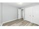 This bedroom features durable gray flooring, closet, and a ceiling light at 315 S Parkway Dr, Anderson, IN 46013