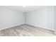 This bedroom features durable gray flooring, base trim, ceiling light at 315 S Parkway Dr, Anderson, IN 46013