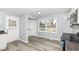 Cozy dining area with new flooring and ample natural light at 315 S Parkway Dr, Anderson, IN 46013