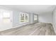 Bright living room featuring stylish gray flooring and lots of natural light at 315 S Parkway Dr, Anderson, IN 46013