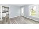 This living room showcases modern gray floors and plentiful natural light at 315 S Parkway Dr, Anderson, IN 46013