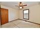 This bright bedroom features neutral walls, carpeted floors and a ceiling fan with lighting at 3451 N County Road 100 E, Danville, IN 46122