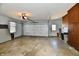 Spacious garage with door, window, and storage cabinets, offering ample room for vehicles and tools at 3451 N County Road 100 E, Danville, IN 46122