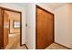 Hallway featuring closet and doorway leading to adjacent room with light-filled window at 3451 N County Road 100 E, Danville, IN 46122