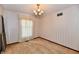 A carpeted room with natural lighting, and a chandelier at 3451 N County Road 100 E, Danville, IN 46122