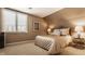 Serene bedroom featuring a bed with a plush comforter and a window for natural light at 4030 Statesmen Dr, Indianapolis, IN 46250