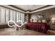 This primary bedroom is complete with hardwood floors and a large window at 4030 Statesmen Dr, Indianapolis, IN 46250