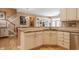 Functional kitchen featuring white cabinets, granite countertops, and stainless steel dishwasher at 4030 Statesmen Dr, Indianapolis, IN 46250