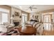Inviting living room with a fireplace, large windows, and comfortable seating creating a cozy atmosphere at 4030 Statesmen Dr, Indianapolis, IN 46250