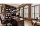This office space features hardwood floors and built in shelving at 4030 Statesmen Dr, Indianapolis, IN 46250