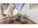 Cozy brick patio featuring stylish outdoor furniture and colorful potted plants for a serene, outdoor living space at 4030 Statesmen Dr, Indianapolis, IN 46250