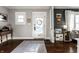 Welcoming foyer with hardwood floors and tasteful decor, creating a warm entry at 4350 N College Ave, Indianapolis, IN 46205